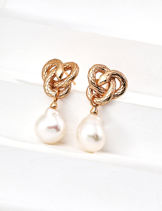 Golden Snake Coiling Around a Pearl
